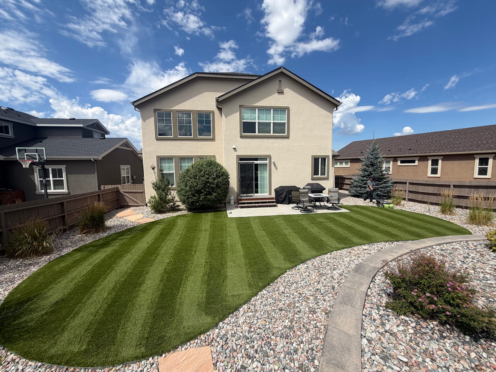 Artificial turf lawn being deep cleaned in Colorado Springs