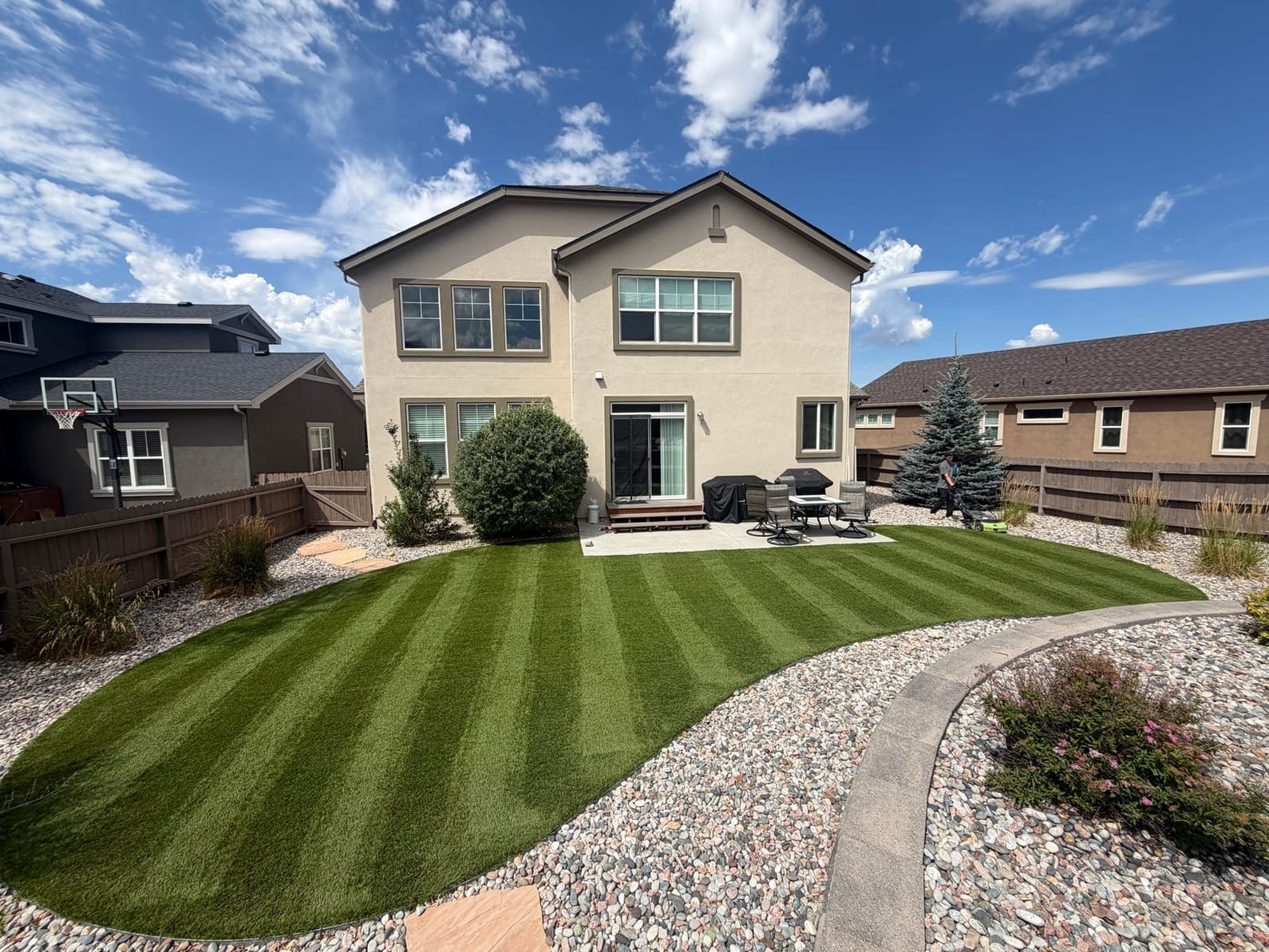 Artificial turf lawn being deep cleaned in Colorado Springs